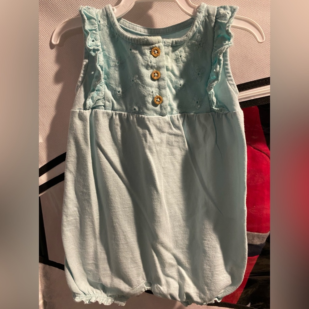 Carter’s Infant Girls Light Blue Romper, size 9 months.
